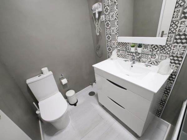 Guest House Triunfo : photo 2 de la chambre chambre familiale (4 adultes)