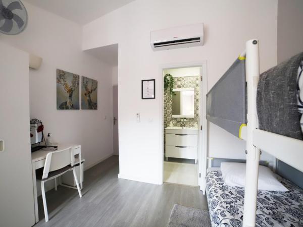 Guest House Triunfo : photo 3 de la chambre chambre familiale (4 adultes)