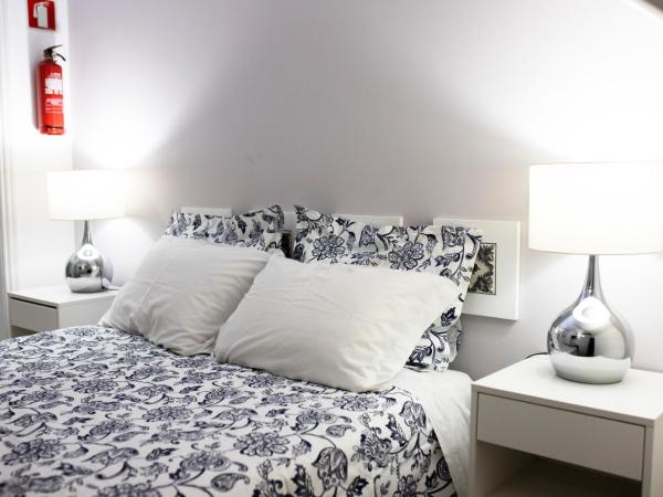 Guest House Triunfo : photo 1 de la chambre chambre double intérieur