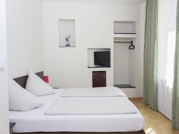 Hotel-Pension Victoria : photo 3 de la chambre chambre double ou lits jumeaux confort 