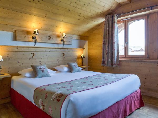 Chalet-Hôtel Le Beausoleil, The Originals Relais : photo 1 de la chambre chambre quadruple