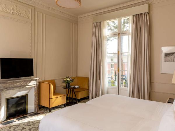 Waldorf Astoria Versailles - Trianon Palace : photo 6 de la chambre chambre lits jumeaux deluxe - palace 5 Étoiles - vue sur jardin