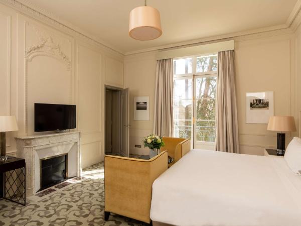 Waldorf Astoria Versailles - Trianon Palace : photo 3 de la chambre suite lit king-size deluxe - palace 5 Étoiles - vue sur jardin