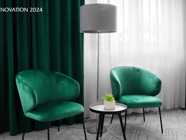 Hotel Polonia Centrum : photo 5 de la chambre chambre double affaires avec accès à la salle de sport