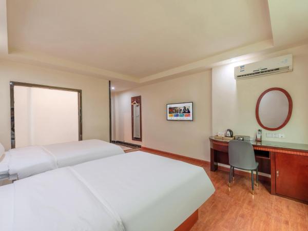 Huahang Hotel - Guangzhou Baiyun International Airport - Free airport shuttle bus : photo 1 de la chambre chambre lits jumeaux spacieuse