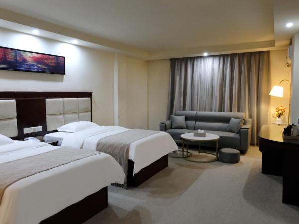 Huahang Hotel - Guangzhou Baiyun International Airport - Free airport shuttle bus : photo 2 de la chambre chambre lits jumeaux spacieuse