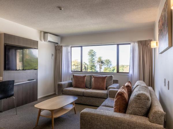 Auckland Rose Park Hotel : photo 3 de la chambre hébergement lit king-size premium avec salon