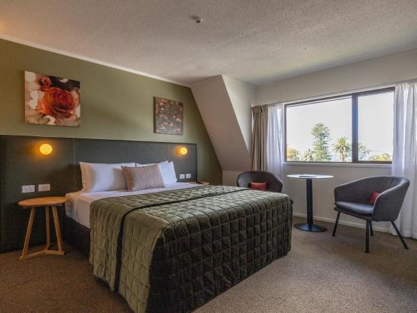 Auckland Rose Park Hotel : photo 1 de la chambre hébergement lit king-size premium avec salon