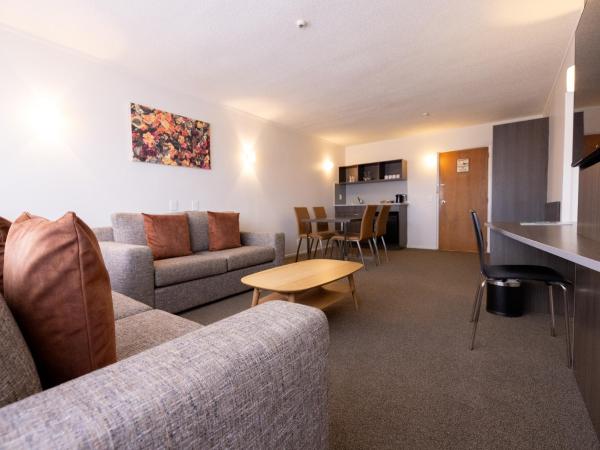 Auckland Rose Park Hotel : photo 4 de la chambre hébergement lit king-size premium avec salon