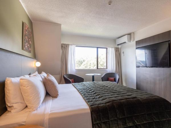 Auckland Rose Park Hotel : photo 2 de la chambre hébergement lit king-size premium avec salon