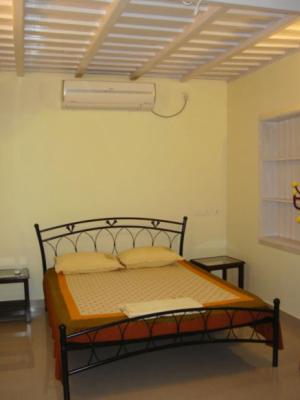 Palm Grove Service Villa : photo 3 de la chambre chambre double climatisée