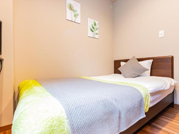 JA Hotel Shinfukae 新深江 : photo 1 de la chambre chambre simple avec salle de bains 