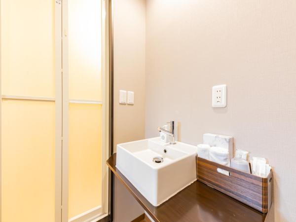 JA Hotel Shinfukae 新深江 : photo 5 de la chambre chambre simple avec salle de bains 