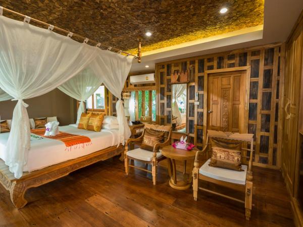 Santhiya Tree Koh Chang Resort : photo 4 de la chambre villa jardin - transfert aller-retour régulier en hors-bord 
