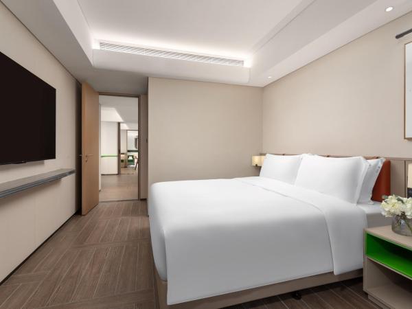 Holiday Inn Resort Sanya Bay, an IHG Hotel : photo 2 de la chambre suite 2 chambres