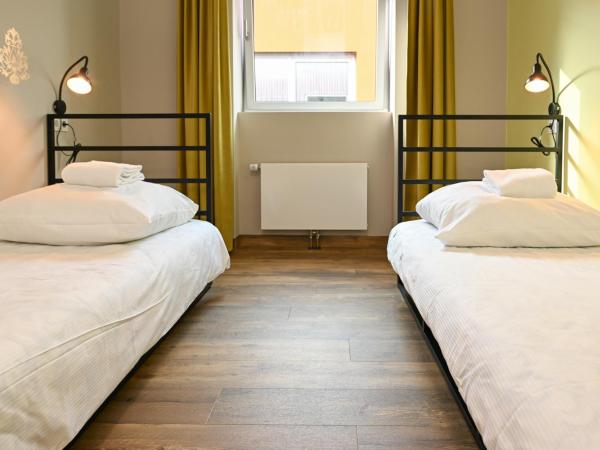 Wombat's City Hostel Munich Werksviertel : photo 2 de la chambre chambre lits jumeaux