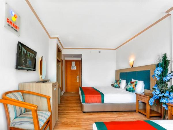 Club Mirabell Hotel All İnclusive : photo 2 de la chambre chambre quadruple confort