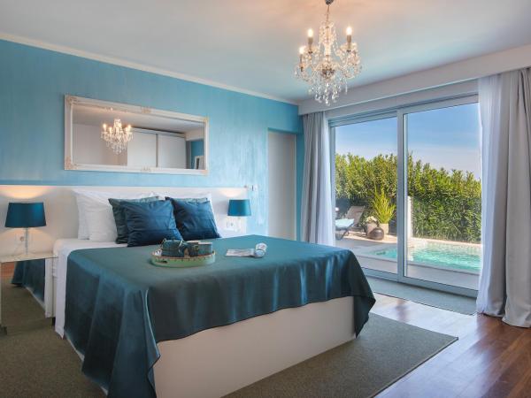 Monvidal by Bura Hotels - Adults Only : photo 1 de la chambre chambre lit king-size - vue sur piscine