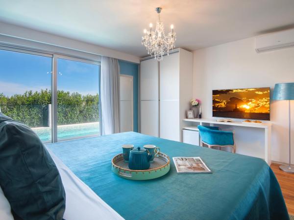 Monvidal by Bura Hotels - Adults Only : photo 3 de la chambre chambre lit king-size - vue sur piscine