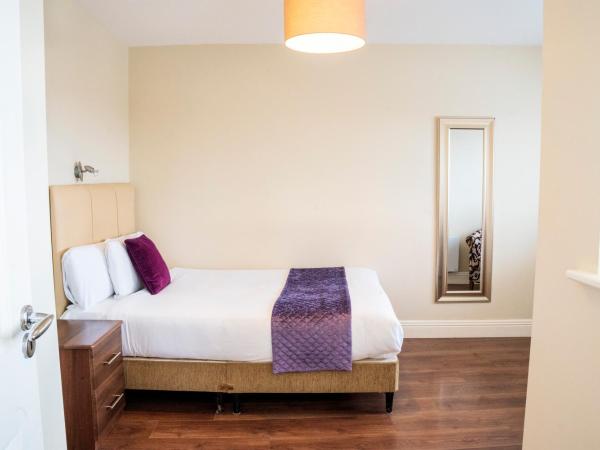 St Bridget's Apartments : photo 1 de la chambre appartement avec balcon