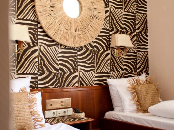 Boutique Hotel Krone München : photo 1 de la chambre hébergement lits jumeaux trendy