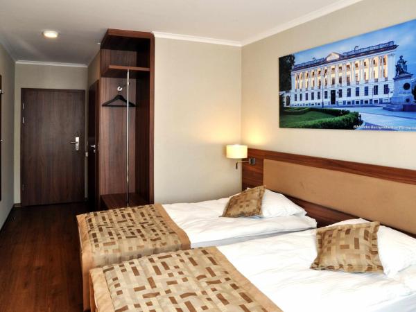 Hotel Topaz Poznań Centrum : photo 4 de la chambre chambre lits jumeaux deluxe