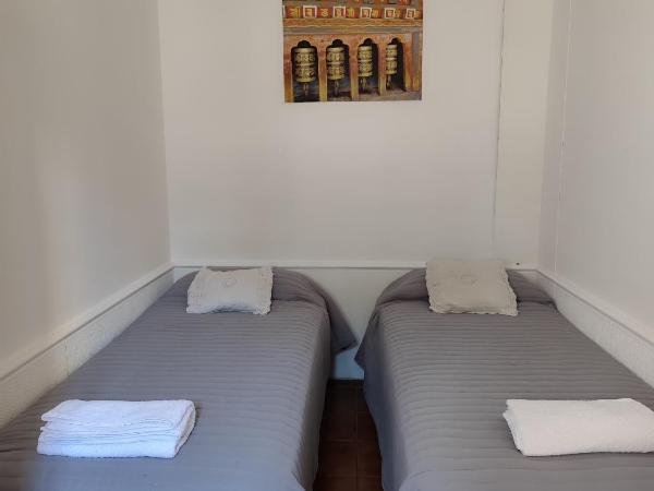 Tanino Home Suites : photo 3 de la chambre petite chambre double ou lits jumeaux