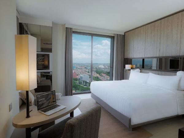 Whiz Luxe Hotel Spazio Surabaya : photo 1 de la chambre grande chambre deluxe