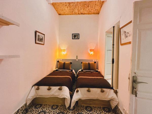Riyad zen oasis : photo 1 de la chambre chambre lits jumeaux