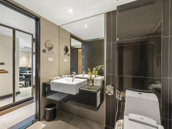 Golden Tulip Mandison Suites : photo 5 de la chambre chambre lits jumeaux deluxe