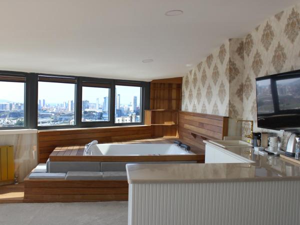 Aram Otel Business & Luxury : photo 1 de la chambre suite lit queen-size – vue sur mer