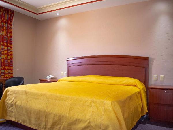 Auto Hotel Estrella del Sur : photo 1 de la chambre chambre lit king-size deluxe