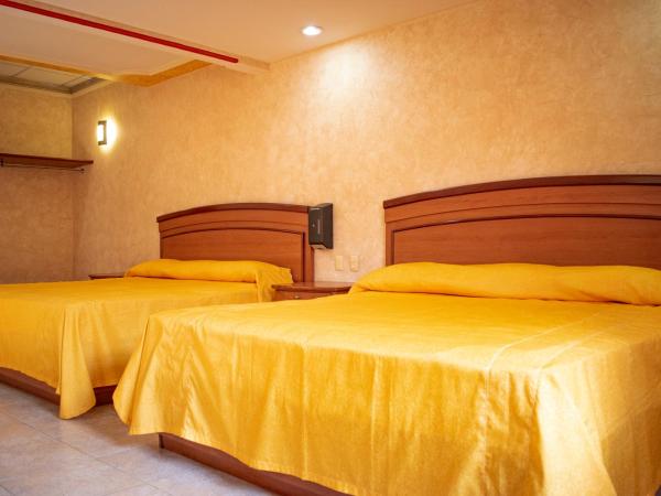 Auto Hotel Estrella del Sur : photo 9 de la chambre chambre double standard avec 2 lits doubles