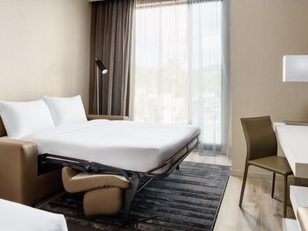 AC Hotel by Marriott Jacksonville St Johns Town Center : photo 7 de la chambre king room with sofa bed and city view - high floor