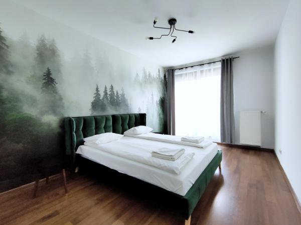 Turnau City Aparthotel : photo 1 de la chambre appartement avec balcon