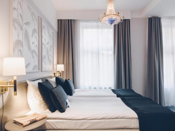 Crystal Plaza Hotel : photo 3 de la chambre chambre lits jumeaux standard