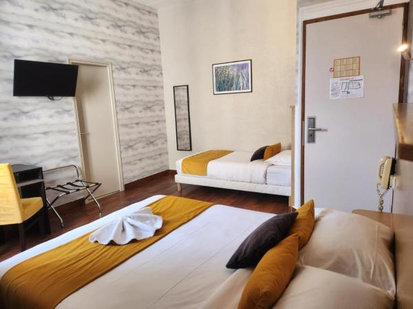 Hôtel Abalone - Centre Gare : photo 9 de la chambre chambre triple