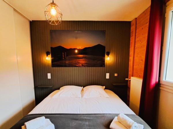 Hôtel Les Mouflons : photo 3 de la chambre chambre quadruple avec balcon