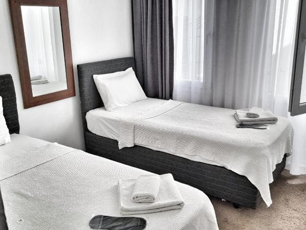 Merkez Kumsal Pansiyon : photo 2 de la chambre chambre lits jumeaux standard