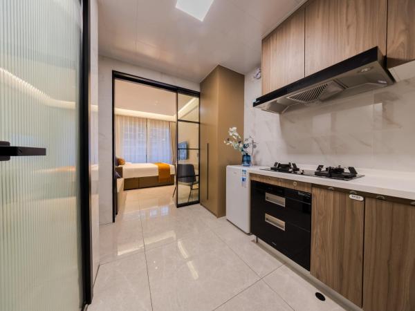 Xi Ke Executive Apartment - Shenzhen Futian Exhibition Center : photo 4 de la chambre chambre king confort