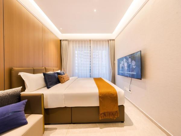 Xi Ke Executive Apartment - Shenzhen Futian Exhibition Center : photo 1 de la chambre chambre king confort