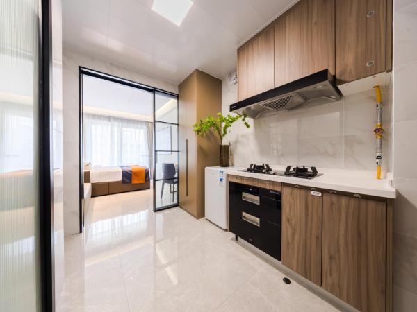 Xi Ke Executive Apartment - Shenzhen Futian Exhibition Center : photo 6 de la chambre chambre lit king-size classique