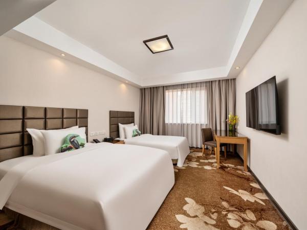 GuangDong Hotel Shanghai : photo 2 de la chambre chambre familiale