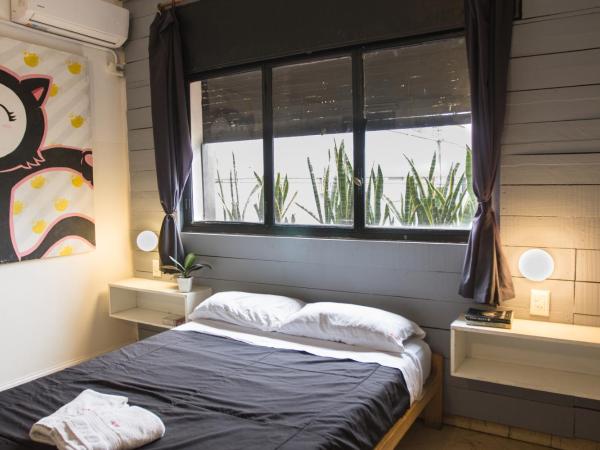 Aldea Hostel : photo 10 de la chambre chambre familiale avec salle de bains privative