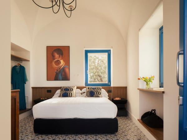 Relais Palazzo del Barone : photo 1 de la chambre chambre double de luxe - vue partielle sur mer - annexe