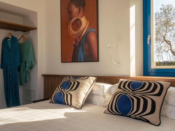 Relais Palazzo del Barone : photo 2 de la chambre chambre double de luxe - vue partielle sur mer - annexe