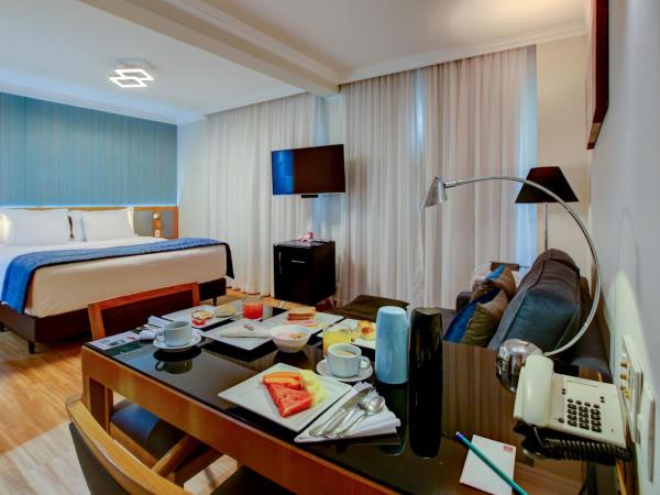 Quality Suítes Oscar Freire : photo 1 de la chambre business class suite king bed
