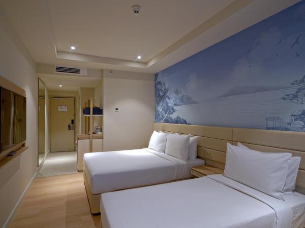 Cititel Express Kota Kinabalu : photo 2 de la chambre chambre triple supérieure