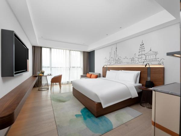 UrCove Xi'an Hi-Tech Software Park : photo 2 de la chambre chambre supérieure lit queen-size