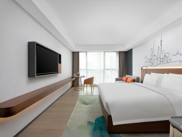 UrCove Xi'an Hi-Tech Software Park : photo 1 de la chambre chambre supérieure lit queen-size